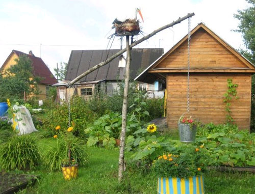 Сад в русском стиле: естественная красота и добротная практичность в фото
