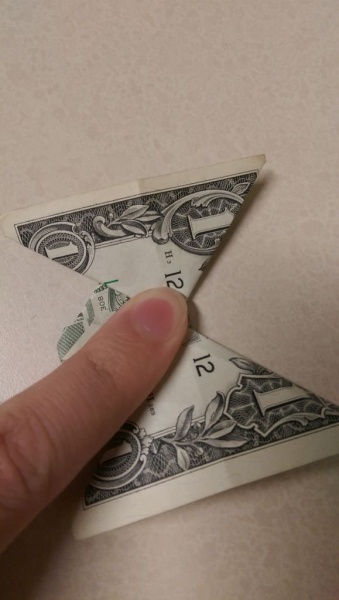 Бабочка из денег в технике оригами в фото