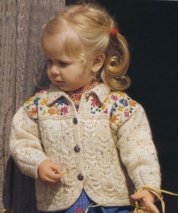 Жакет спицами с вышивкой для малыша в фото