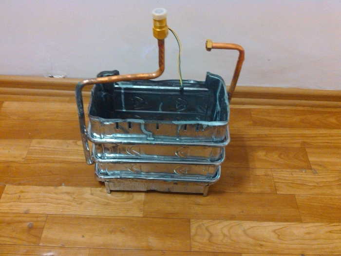 Теплообменник для газовой колонки: зачем нужен радиатор, как его запаять и почистить