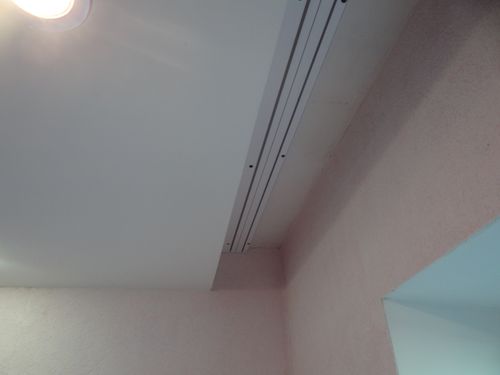 Скрытые шторы в натяжном потолке